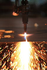 Metal Cutting Process with Industrial Torch and Bright Sparks
