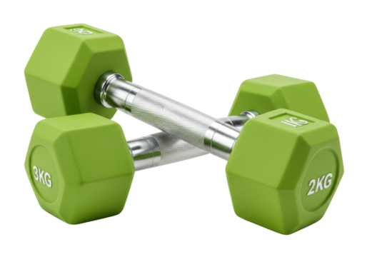 Isolated dumbbells with green coating for fitness and workout on floor, studio shot