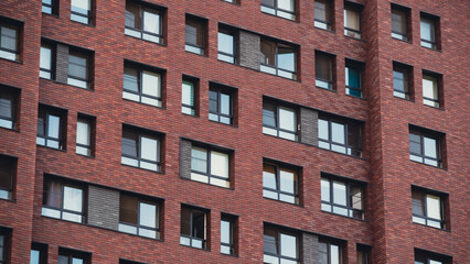 mirrored windows of the facade of an office building