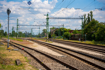 Budapest, Hungary - May 31, 2025: Railway tracks extending into the distance under an open sky