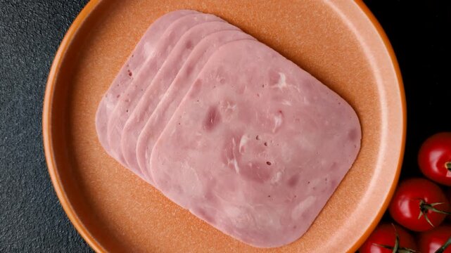 Meat, square ham sliced, organic food, protein for snacks. Sliced ham as a background