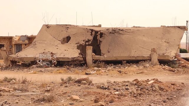 Bombed building in Aleppo, Syria, collapsed over a car standing in ruins after years of devastating war. Destroyed structure and scattered debris reflect the aftermath of heavy conflict and airstrikes