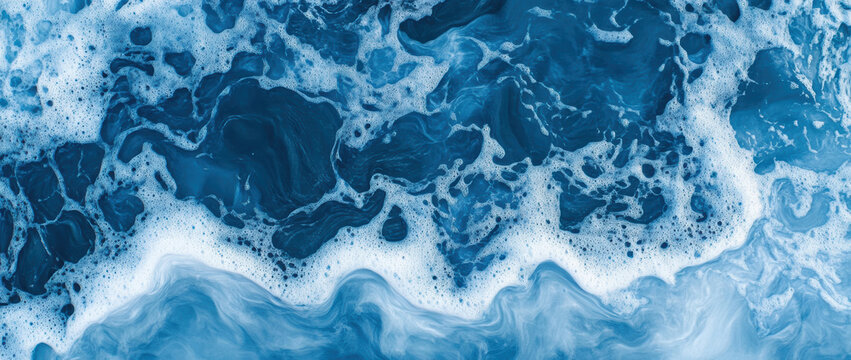 Dynamic ocean waves with foamy texture in clear blue water