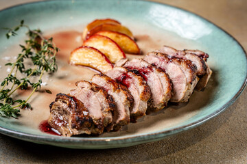 roasted duck breast with plum sauce and thyme