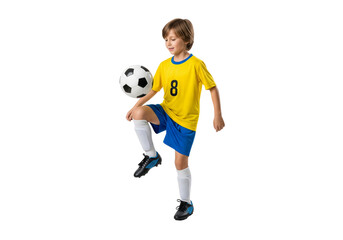 A young boy expertly controlling a soccer ball with his knee, focused and skilled