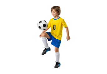 A young boy expertly controlling a soccer ball with his knee, focused and skilled