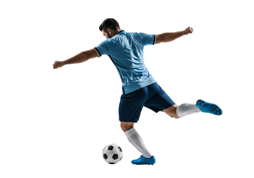 A soccer player skillfully kicking a soccer ball in action. The athlete is captured in a dynamic pose