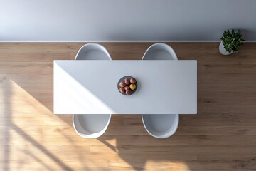 Top view of a white table with chairs and a plant in a room.