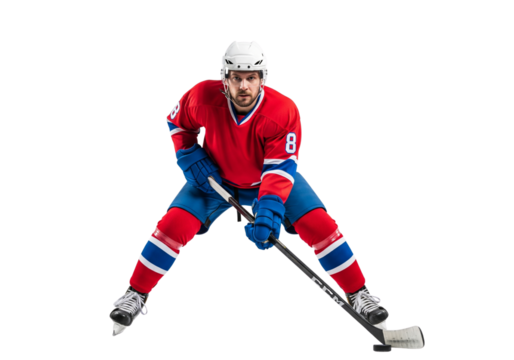 A determined hockey player in action, focused on the game and ready to score