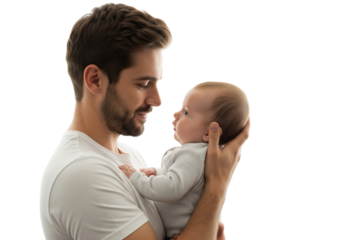 A tender moment between father and baby, showcasing the bond of love. A parent and child stare at each other with eyes of affection