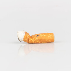 Cigarette Butt on White Background