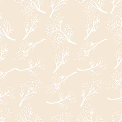 Seamless pattern with white tree branches on beige background.