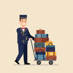 Obraz premium Bellhop pushes luggage cart