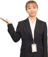 どうぞのポーズをしているビジネススーツを着た女性