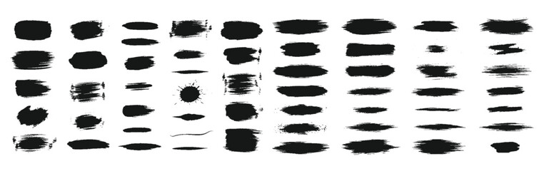 Collection of black brush strokes and splatters isolated on white background