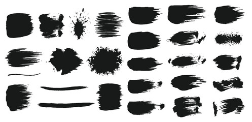 Set of black paint brush strokes and splatters isolated on white background