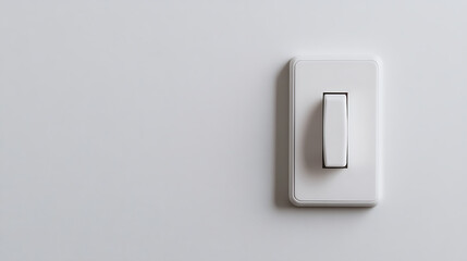 Fototapeta premium A minimalist image of a white light switch mounted on a plain white wall, capturing a clean, simple, and functional design.