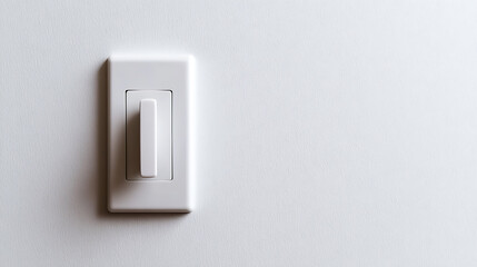 A sleek, white rocker light switch mounted on a clean, white wall, presenting a modern and minimalist aesthetic.
