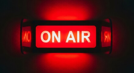 Bright red on air sign or indicator. Studio light indicating live news, radio, television broadcast. Recording studio media production concept.