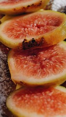 Close-up of fresh fig slices on a fresh golden pastry dusted with powdered sugar and vanilla cream. Gourmet breakfast pastry local to Tuscany, Italy