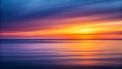Vibrant sunset over calm ocean with dramatic colorful clouds