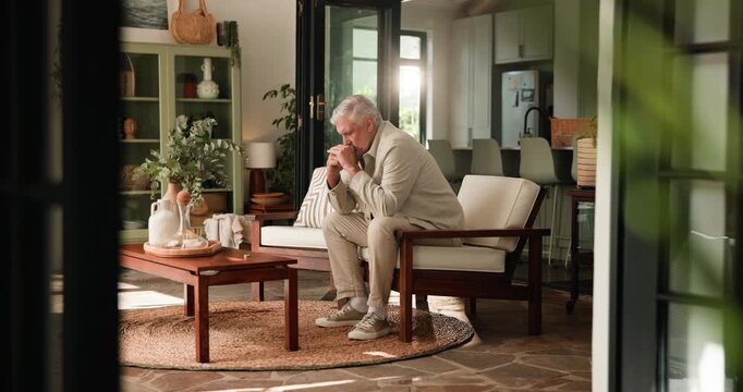 Sad, elderly man and thinking in house with mental health reflection, memory loss and contemplation. Retirement, thoughtful and senior person with depression, grief and dementia in home living room.