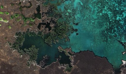 Galapagos Islands Coastline: Aerial View of Volcanic Terrain, Pristine Beaches, and Pacific Ocean Waters