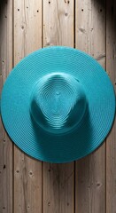 Turquoise Sun Hat on Rustic Wood - A Summer Accessory.