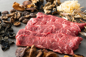 Fresh raw meat, dried mushroom ingredients