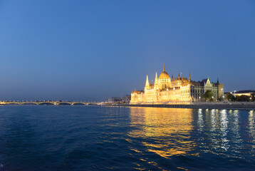 View of Hungarian Parliament Building with night lighting, Budapest.