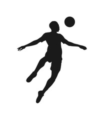 Dynamic silhouette of a soccer player in mid air heading the ball during a match