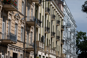 Fototapeta premium Explore the enchanting beauty of charming European architecture adorned with lovely balconies