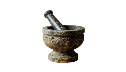 Ancient stone mortar and pestle, close-up on black background