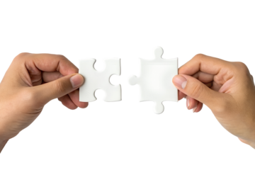 Two hands carefully hold separate white puzzle pieces, preparing to connect them, showing collaboration and a coming solution. Isolated transparent png.