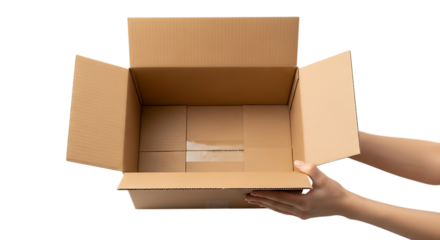 Hands holding open cardboard box on dark background offering goods