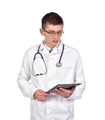 A doctor in a lab coat holds tablet.