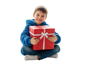 Child holding red gift box in joyful holiday moment