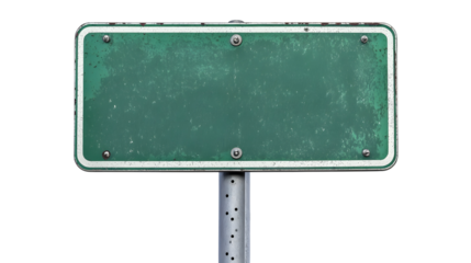 Weathered green traffic sign on metal pole isolated on black background