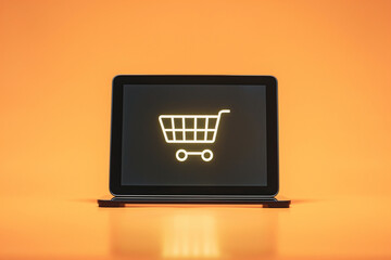 The tablet device sits in a minimal stock studio environment, showcasing a glowing shopping cart icon against a vibrant orange background. It highlights online shopping trends and technology