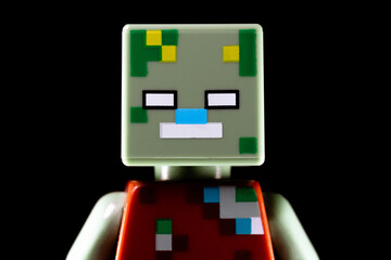 Naklejka premium Face of LEGO Minecraft Drowned on a black background