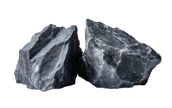 Two rough, gray stones of differing shapes, set against a stark black background