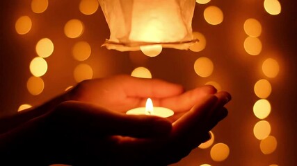 a paper lantern with candle flame inside, background bokeh of floating lights, emotional soft focus macro style. - Powered by Adobe