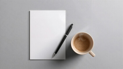 minimal flat lay with blank paper, pen, and coffee cup