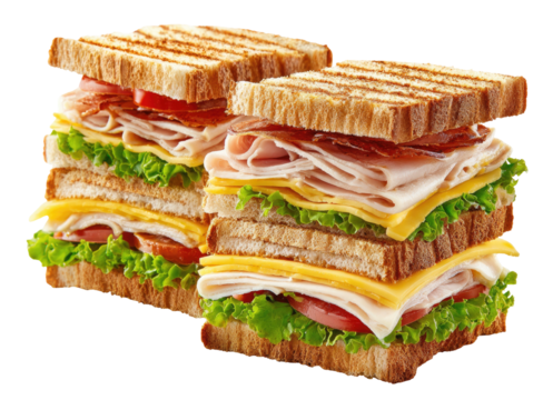 Delicious sandwiches, stacked high with cheese, meat, tomatoes, and lettuce. Toasted bread