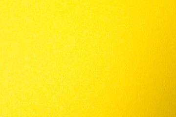 Abstract art, yellow paper background. Abstract design of monochrome paper background