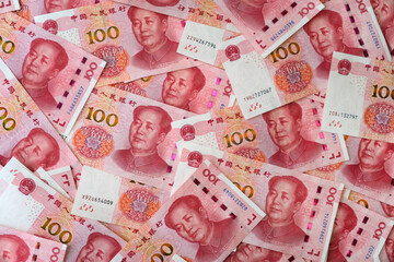 background of money. currency of PBOC or people's bank of china. One hundred CNY Chinese yuan bill....