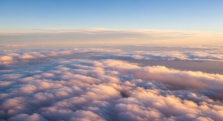 Sunrise Over Vast Ocean of Clouds During Flight