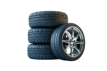 Stack of four black tires beside single, shiny, car wheel