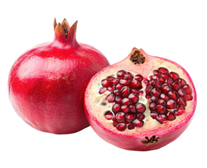 Ripe pomegranate whole and halved, revealing vibrant ruby-red seeds