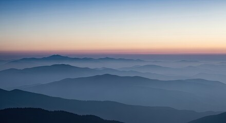 Fototapeta premium Serene Misty Mountain Ranges at Dawn Soft Horizon Glow